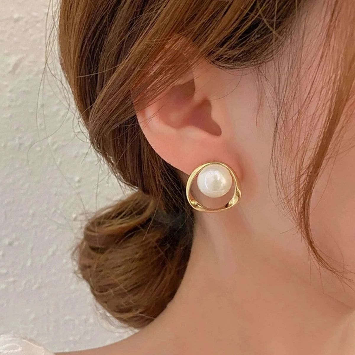 Pearl fishtail earrings